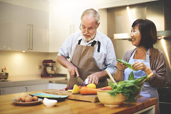 Seniors Sign a HECM Loan Retirees discuss HECM Home Equity Conversion Mortgage