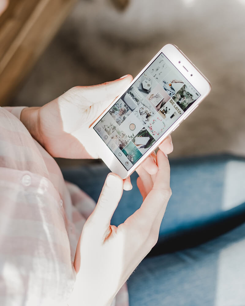 A first time homebuyer browsing Instagram for houses